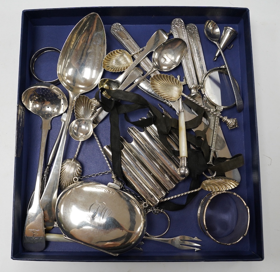 An Edwardian silver folding pen holder, by Jordan & Raybould, London, circa 1902, 7cm, together with an Edwardian silver purse, two silver napkin rings, a small quantity of assorted flatware including George III table sp